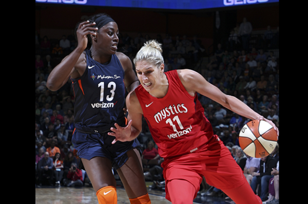 WASHINGTON, D.C. (June 26, 2018) - Elena Delle Donne dribbles past Chiney Ogwumike. Photo: NBAE/Getty Images.