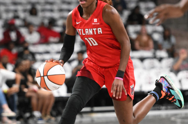 ATLANTA, GA - MAY 11: Rhyne Howard #10 of the Atlanta Dream handles the ball during the game against the Los Angeles Sparks on May 11, 2022 at State Farm Arena in Atlanta, Georgia. NOTE TO USER: User expressly acknowledges and agrees that, by downloading and/or using this Photograph, user is consenting to the terms and conditions of the Getty Images License Agreement. Mandatory Copyright Notice: Copyright 2022 NBAE (Photo by Adam Hagy/NBAE via Getty Images)